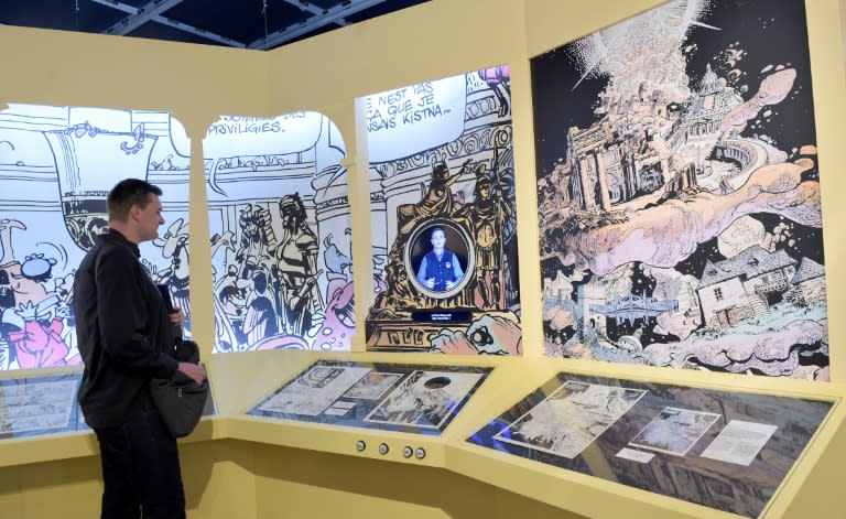 A person visits an exhibition dedicated to French science fiction comics series Valérian and Laureline at the Cite des Sciences et de l'Industrie museum in Paris