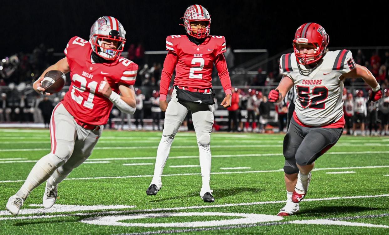 Shelby's Skyler Winters gets ready to lower his shoulder for extra yards during the Whippets' 71-41 win over Van Wert on Friday night.