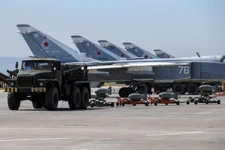 Russian military jets are seen at Hmeymim air base in Syria, June 18, 2016. REUTERS/Vadim Savitsky/Russian Defense Ministry via Reuters