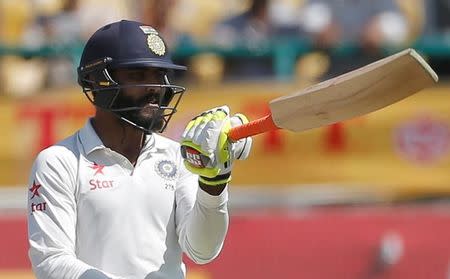 Cricket - India v Australia - Fourth Test cricket match - Himachal Pradesh Cricket Association Stadium, Dharamsala, India - 27/03/17 - India's Ravindra Jadeja celebrates his half century. REUTERS/Adnan Abidi