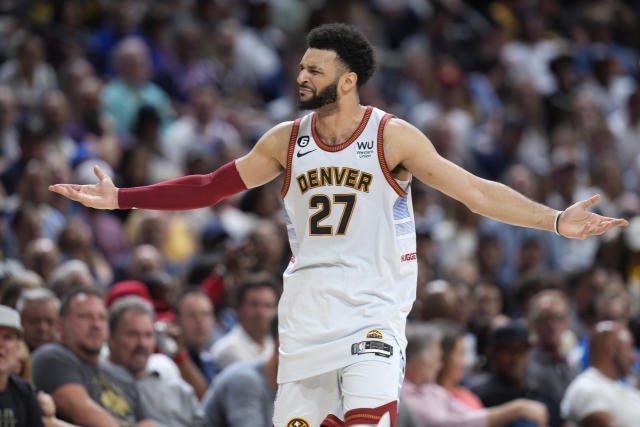 Denver Nuggets guard Jamal Murray argues for a call during the second half of Game 5 of the team's NBA Western Conference basketball semifinal playoff series against the Phoenix Suns on Tuesday, May 9, 2023, in Denver. (AP Photo/David Zalubowski)