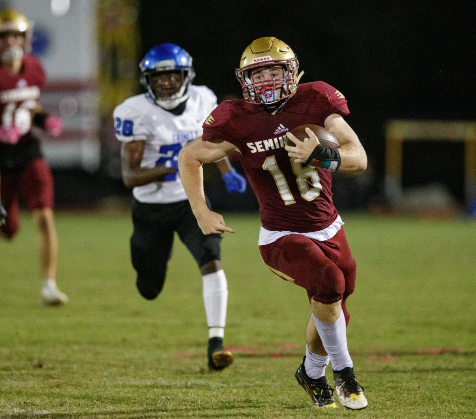 Florida High's Rhyder Poppell (18) brings the ball down the field. The Florida High Seminoles defeated the Trinity Christian Conquerers 31-17 Friday, Oct. 15, 2021.