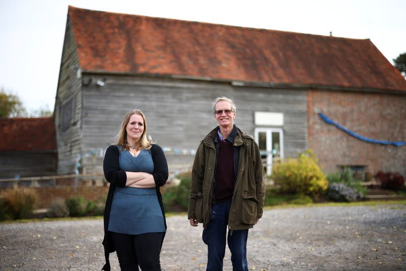 Antony Penrose and Ami Bouhassane, son and granddaughter of American photographer and surrealist Lee Miller, pose at Farleys House & Gallery, which they run together, in Muddles Green