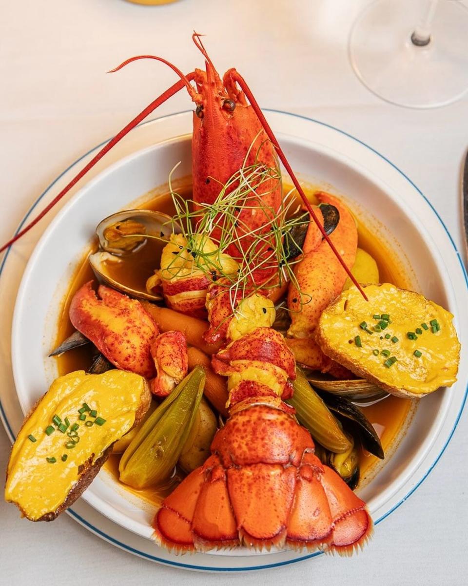 Lobster, shrimp, clams, mussels, vegetables, croutons and rouille populate La Goulue’s Bouillabaisse Royale.