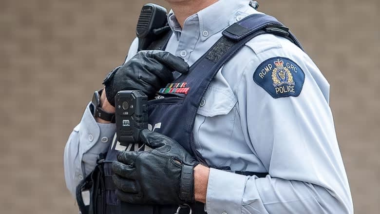 An RCMP officer is shown wearing a body camera at the detachment in Bible Hill, N.S.