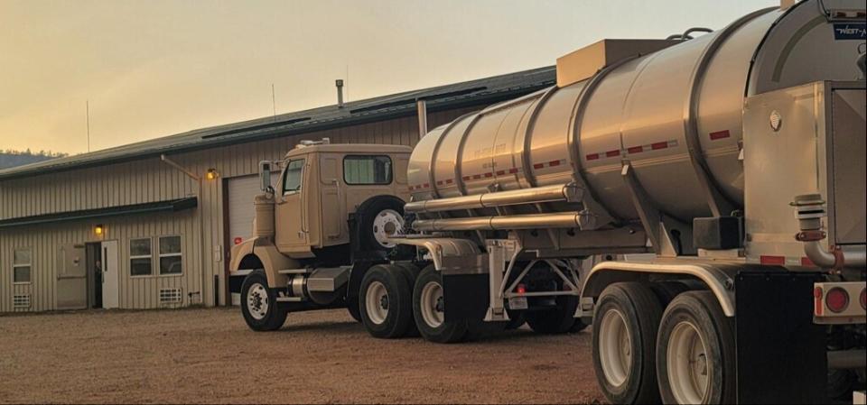 In this photo provided by the New Mexico National Guard, a New Mexico National Guard truck is ready to deliver potable water to communities in response to the Calf Canyon/Hermits Peak fire in northern New Mexico on Sunday, May 1, 2022. Thousands of firefighters battled destructive wildfires in the Southwest as more residents prepared to evacuate Friday into the weekend in northern New Mexico where strong winds and dangerously dry conditions have made the blazes hard to contain. (New Mexico National Guard via AP)