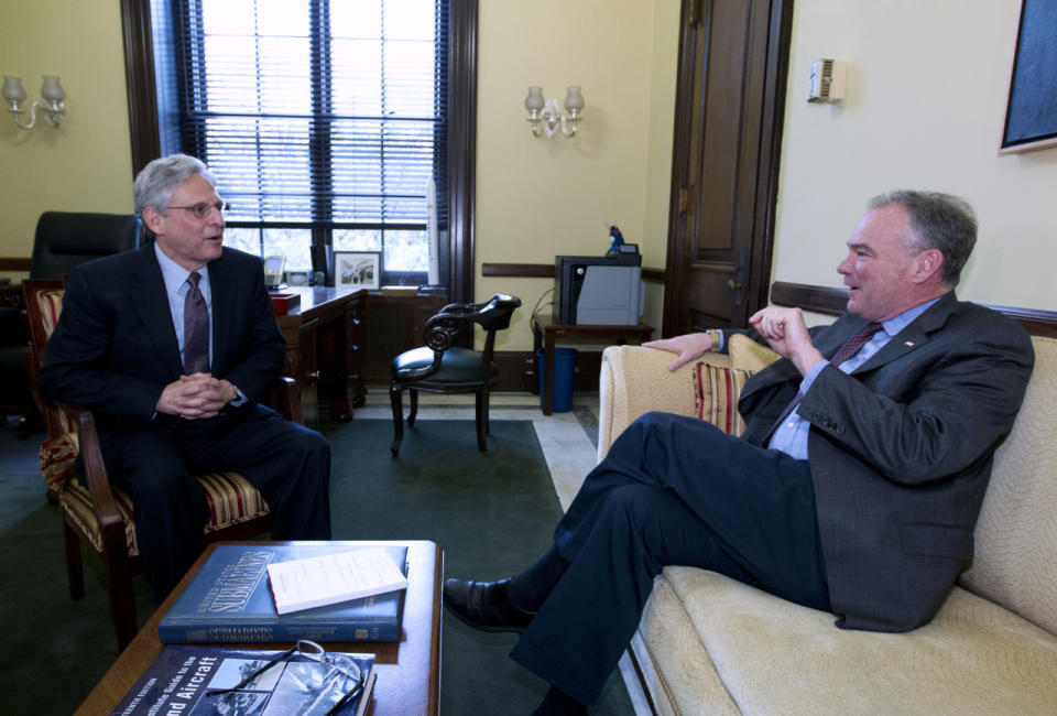 <p>Judge Merrick Garland, left, President Obama’s choice to replace the late Justice Antonin Scalia on the Supreme Court, meets with Sen. Tim Kaine on Capitol Hill, April 21, 2016. (Photo: Jose Luis Magana/AP)</p>