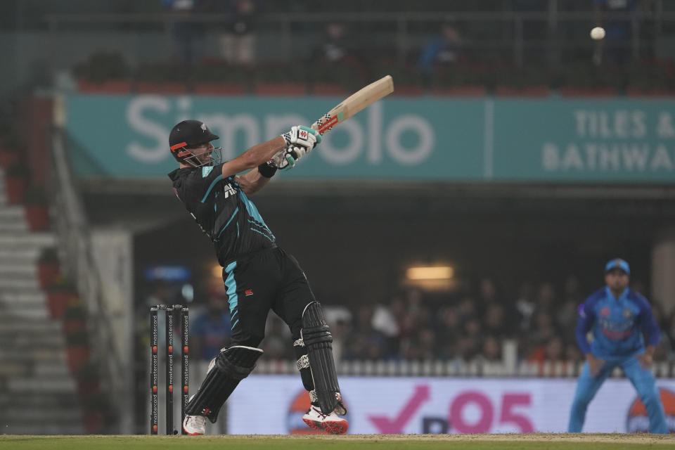 New Zealand's Daryl Mitchell plays a shot during the first Twenty20 cricket match between between India and New Zealand in Ranchi, India, Friday, Jan. 27, 2023. (AP Photo/Bikas Das)