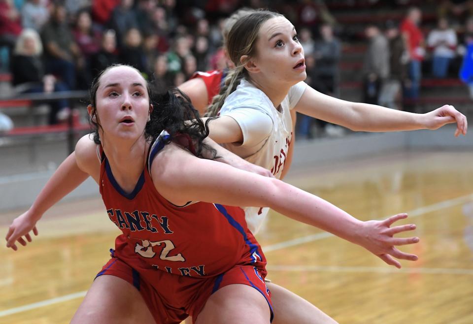 Caney Valley KS High School's senior Kimberly Owens (32) blocks out during basketball action in an earlier season game in Dewey.