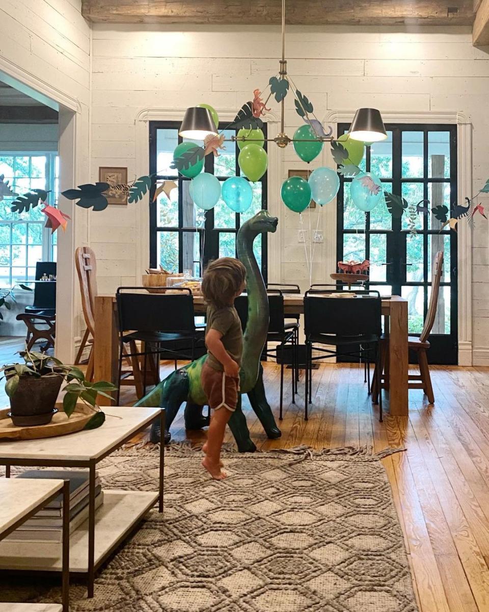 Chip and Joanna’s sprawling estate boasts a lush garden, tons of space for their kids to play and a lovely open kitchen. They completed renovations on the living room of their farmhouse in February 2021. The brick fireplace and vintage bookshelf were perfect touches to the space.