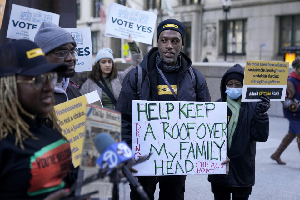 Brian Rodgers participates in a rally prior to a court hearing Wednesday, Feb. 14, 2024, on a Chicago ballot measure that would raise a one-time tax on luxury properties to fund services for homeless people in Chicago. A Cook County judge rejected the ballot measure last week after objections from real estate and business groups. An appeal is pending as early voting begins. (AP Photo/Charles Rex Arbogast)