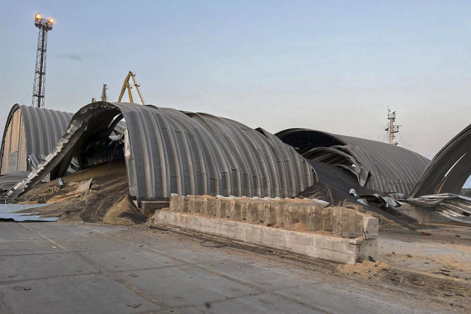 In this photo provided by the Odesa Regional Administration Press Office, a granary destroyed in a Russian drone attack at night is seen in a Danube port near Odesa, Ukraine, early hours Wednesday, Aug. 16, 2023. (Odesa Regional Administration Press Office via AP)