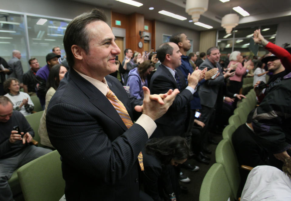 Gavin Maloof, co-owner of the Sacramento Kings, celebrates after the Sacramento City Council approved a plan to help finance a new $391 sports and entertainment arena, in Sacramento, Calif. Tuesday, March 6, 2012. By a 7-2 vote, the City Council approved a non-binding term sheet, signed off by the Kings and the NBA last week, that will keep the team in Sacramento for at least another 30 years. (AP Photo/Rich Pedroncelli)