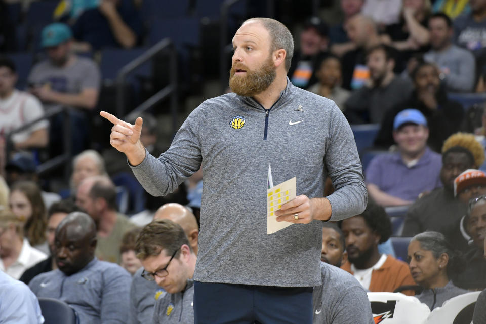 Memphis Grizzlies head coach Taylor Jenkins calls to players in the first half of an NBA basketball game against the Miami Heat, Wednesday, Nov. 8, 2023, in Memphis, Tenn. (AP Photo/Brandon Dill)