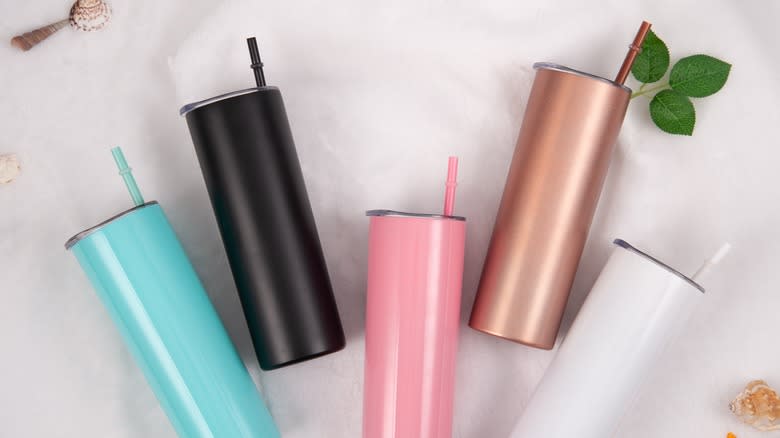 five colorful tumblers