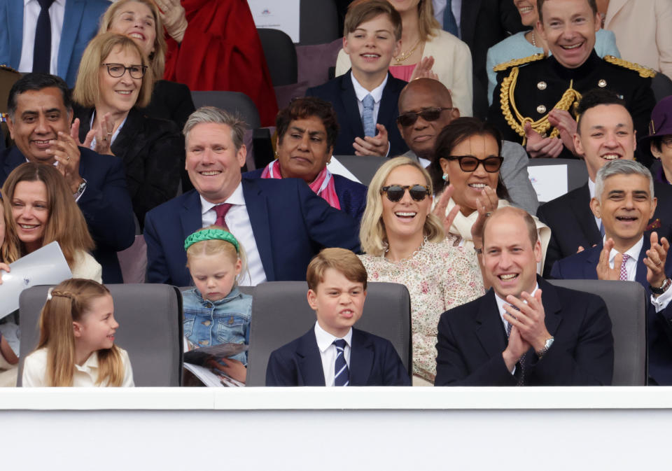 LONDON, ENGLAND - JUNE 05: (L-R 2nd Row) Victoria Starmer, Keir Starmer, Lena Tindall, Zara Tindall, Mayor of London Sadiq Khan, (front row) Princess Charlotte of Cambridge, Prince George of Cambridge and Prince William, Duke of Cambridge watch the Platinum Pageant on June 05, 2022 in London, England. The Platinum Jubilee of Elizabeth II is being celebrated from June 2 to June 5, 2022, in the UK and Commonwealth to mark the 70th anniversary of the accession of Queen Elizabeth II on 6 February 1952.  (Photo by Chris Jackson - WPA Pool/Getty Images)