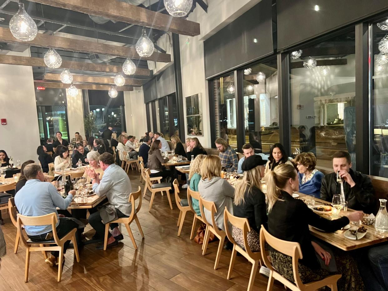 The packed dining room at Bestia Mare seafood restaurant in Franklin, Tenn., on Feb. 20, 2024