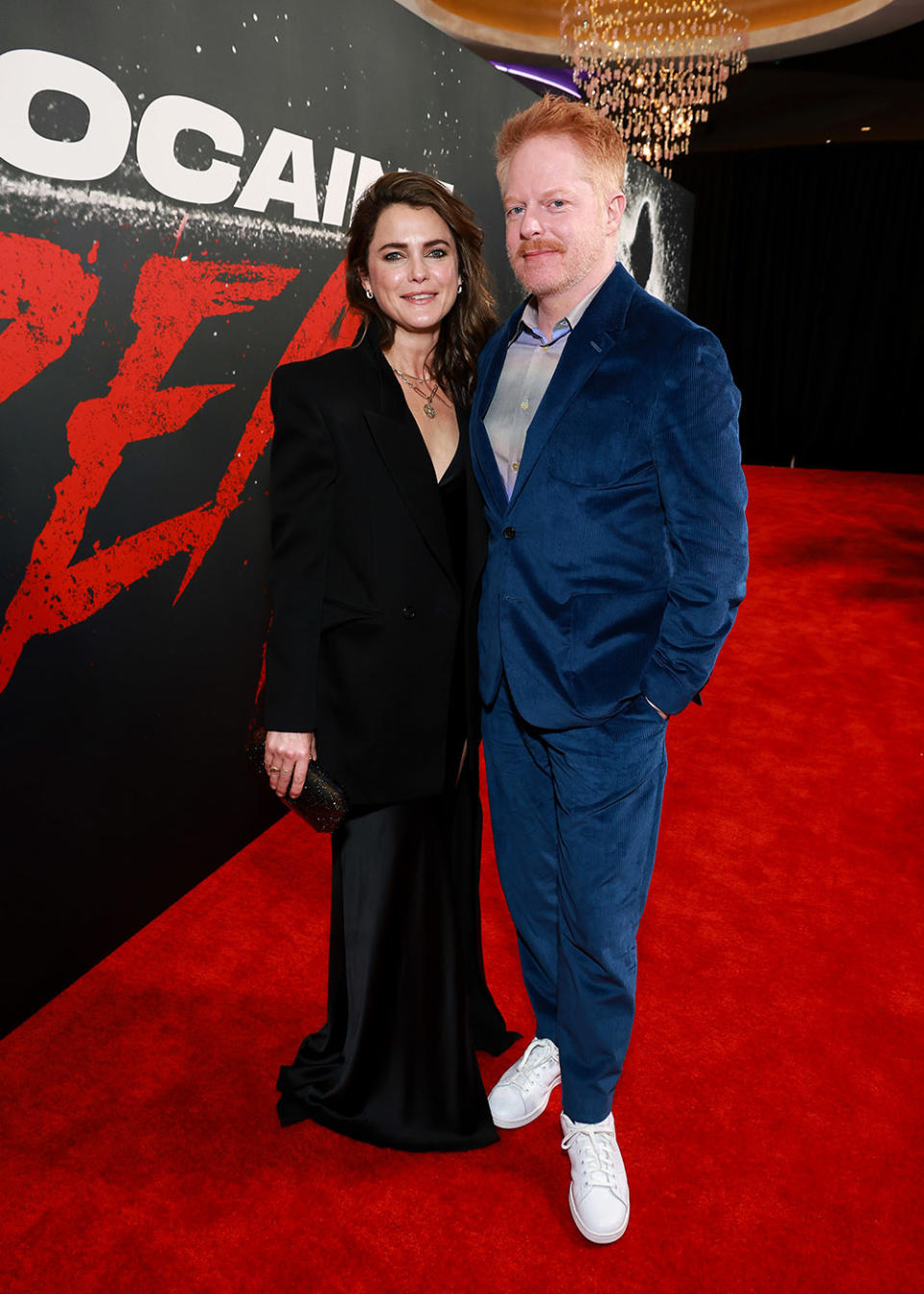 (L-R) Keri Russell and Jesse Tyler Ferguson attend the Los Angeles premiere of Universal Pictures' "Cocaine Bear" at Regal LA Live on February 21, 2023 in Los Angeles, California.