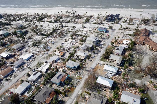 This aerial photo shows damaged homes and debris in the aftermath of Hurricane Ian, Thursday, Sept. 29, in Fort Myers. (Photo: via Associated Press)