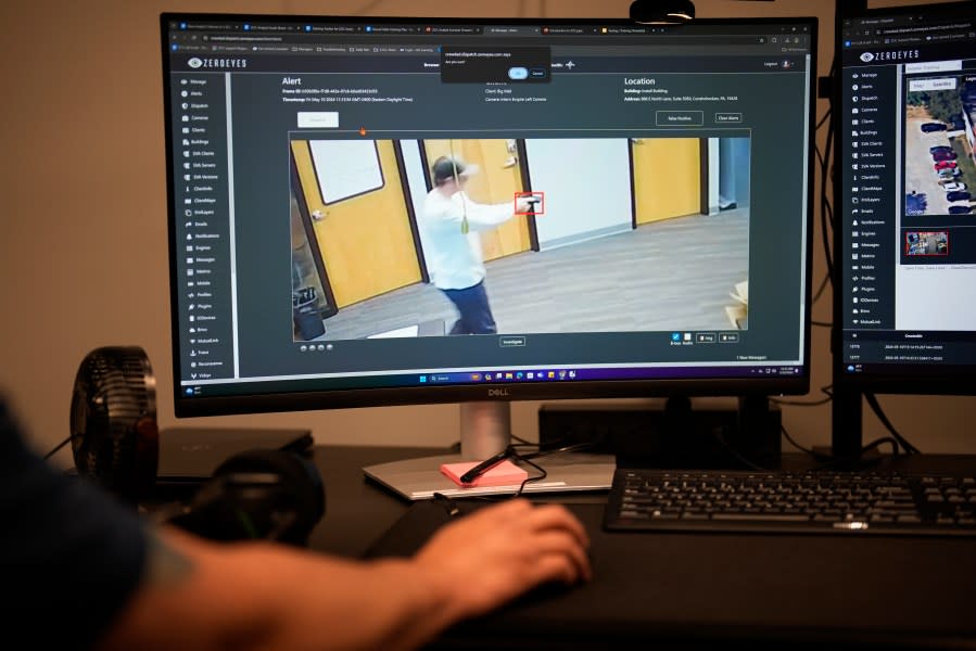 ZeroEyes analyst Mario Hernandez demonstrates the use of artificial intelligence with surveillance cameras to identify visible guns at the company’s operations center, Friday, May 10, 2024, in Conshohocken, Pa. (AP Photo/Matt Slocum)