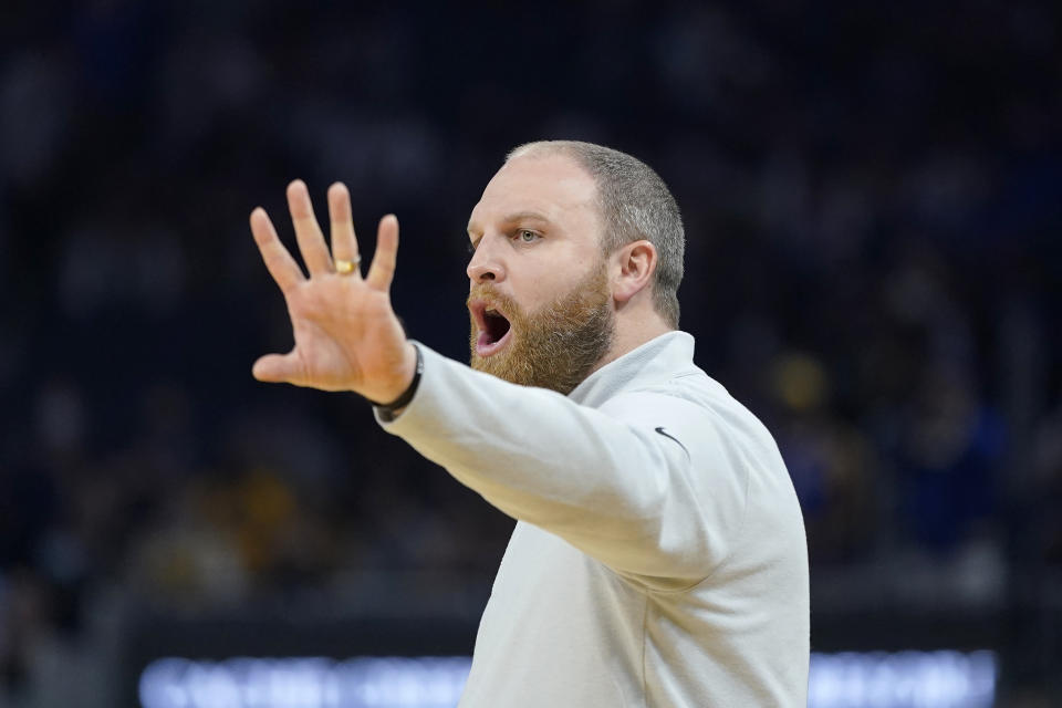 Memphis Grizzlies head coach Taylor Jenkins gestures toward players during the first half of his team's NBA basketball game against the Golden State Warriors in San Francisco, Thursday, Oct. 28, 2021. (AP Photo/Jeff Chiu)