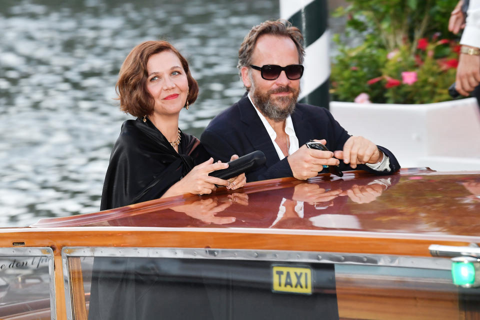 <p>Maggie Gyllenhaal — who made her directorial debut at this year's festival with <em>The Lost Daughter</em> — arrived on Sept. 2 with husband Peter Sarsgaard (who also acted in the film). </p>