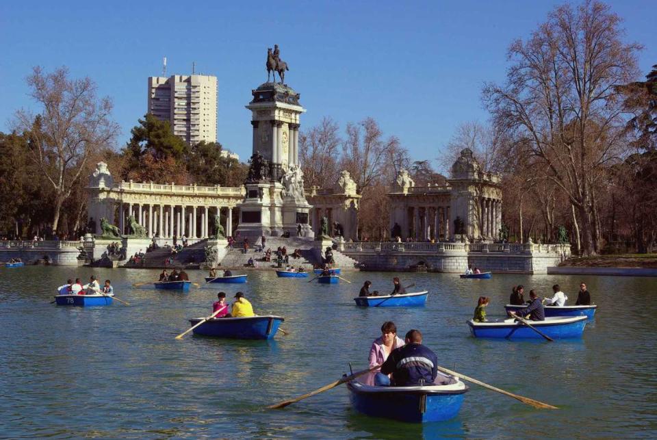 Couples row around the lake in Madrid’s Parque del Buen Retiro where Spanish nobles once staged mock naval battles. (Patricia Harris/TNS)