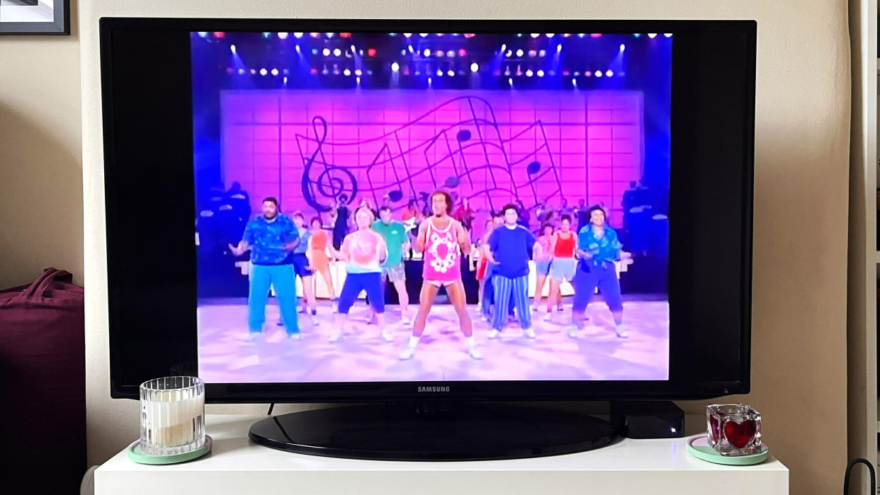  Richard Simmons' 20-minute cardio workout on a TV. 