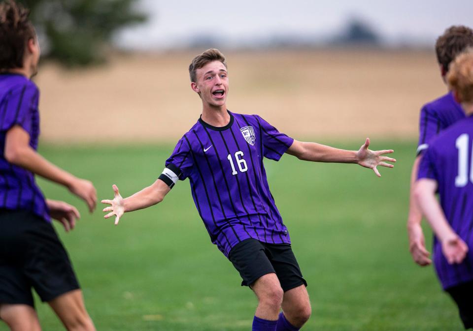 Williamsville's Cameron Frye (16) celebrates a goal by Williamsville's Will Budinger (11) in the second half against Bloomington Central Catholic at Williamsville High School in Williamsville, Ill., Monday, October 4, 2021. [Justin L. Fowler/The State Journal-Register] 