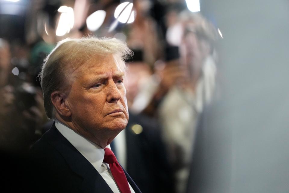 Former President Donald Trump speaks with reporters in the spin room at the Pennsylvania Convention Center after the ABC News Presidential Debate between him and Vice President Kamala Harris on Sept. 10, 2024.