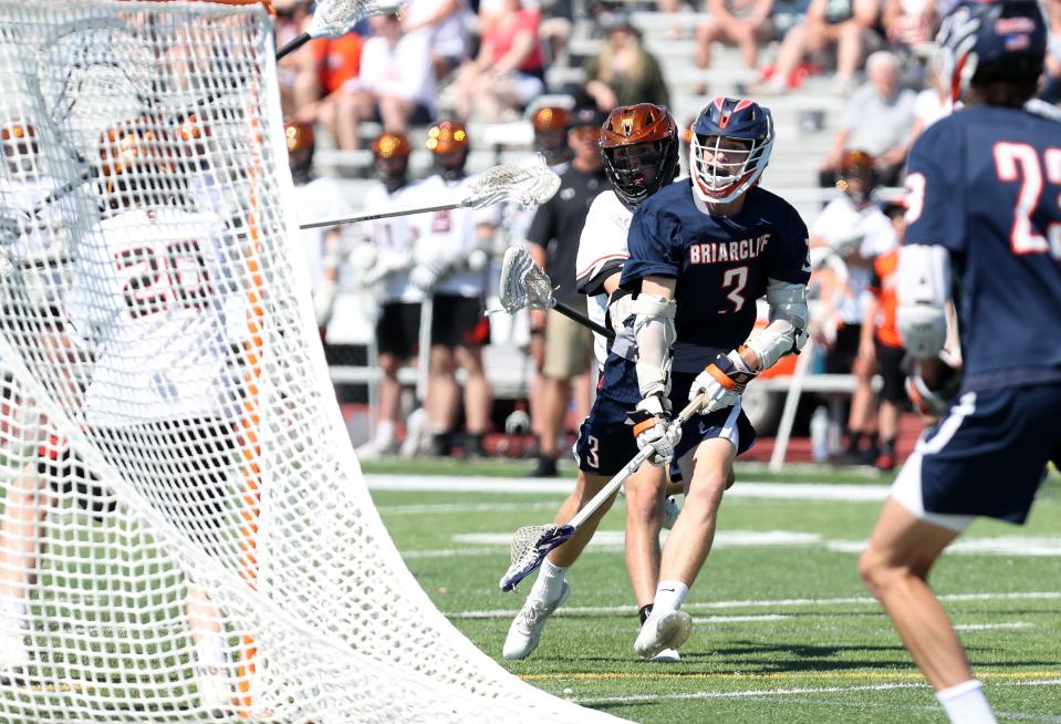 Briarcliff's Lucas Proctor (3) fires a shot for a first half goal against Schuylerville during the boys lacrosse Class D regional final at Shaker High School in Albany June 4, 2022.  Briarcliff won the game 14-2.