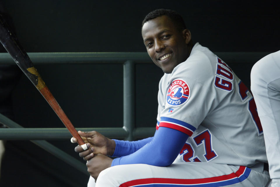 Montreal Expos slugger Vladimir Guerrero laughs in the dugout during a game against the San Francisco Giants at Pac Bell Park on May 14, 2003 in San Francisco, California. (Getty Images)