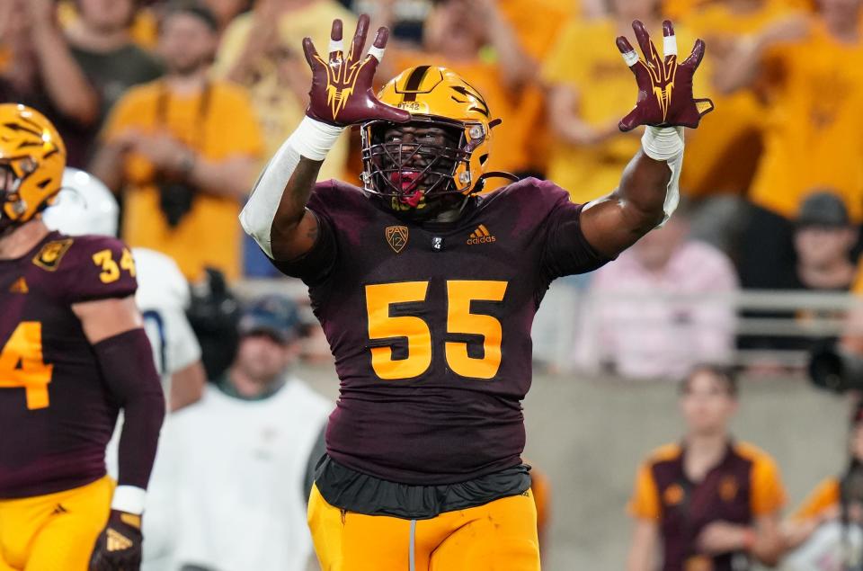 Sep 1, 2022; Tempe, Arizona, USA; Arizona State Sun Devil defender Omarr Norman-Lott (55) celebrates a tackle in the backfield against the Northern Arizona Lumberjacks at Sun Devil Stadium.