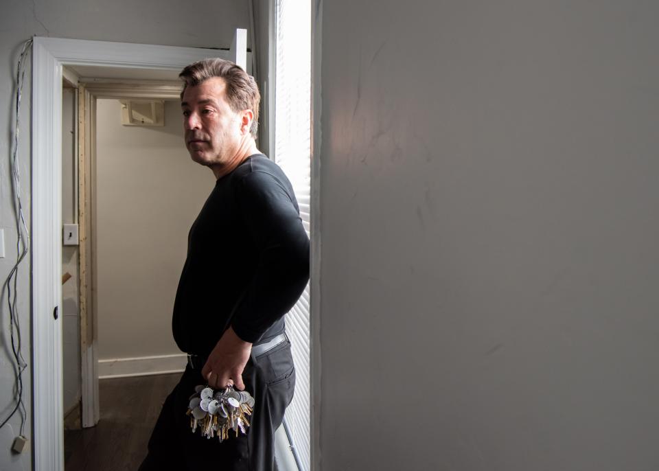 Tom Skiffington, owner of the Bush House Hotel, in Quakertown, stands inside a third floor unit, Monday, April 4, 2022.