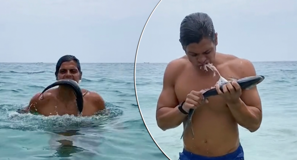 Influencer pictured in the ocean eating a live fish.