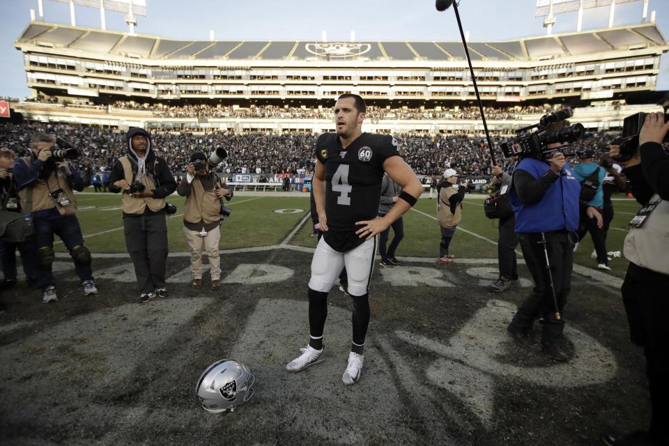 For Derek Carr and Raiders fans who stuck it out despite the team’s pending move, Sunday was a bitter defeat in the final game in Oakland. (AP Photo/Ben Margot)