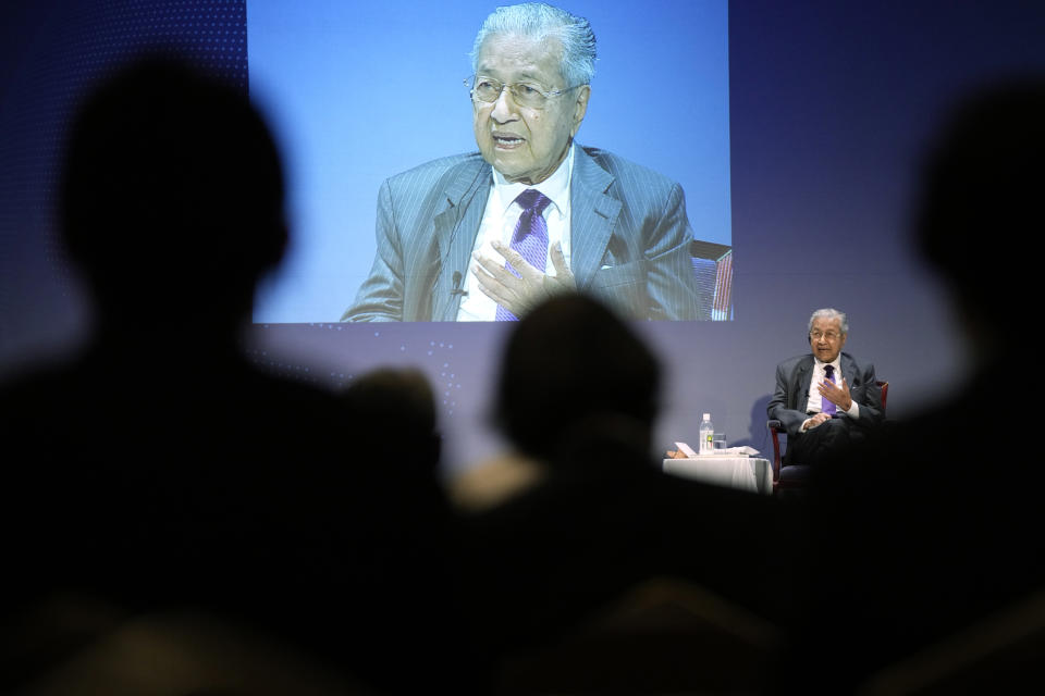 Malaysia's former Prime Minister Mahathir Mohamad answers a question at a session of the International Conference on "The Future of Asia" Friday, May 27, 2022 in Tokyo. (AP Photo/Eugene Hoshiko)