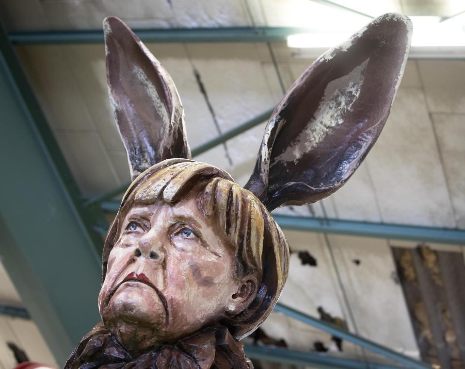 A figure depicting German Chancellor Angela Merkel is shown during a press preview in a hall of the Mainz carnival club in Mainz, Germany, Feb. 26, 2019. (Photo: Michael Probst/AP)