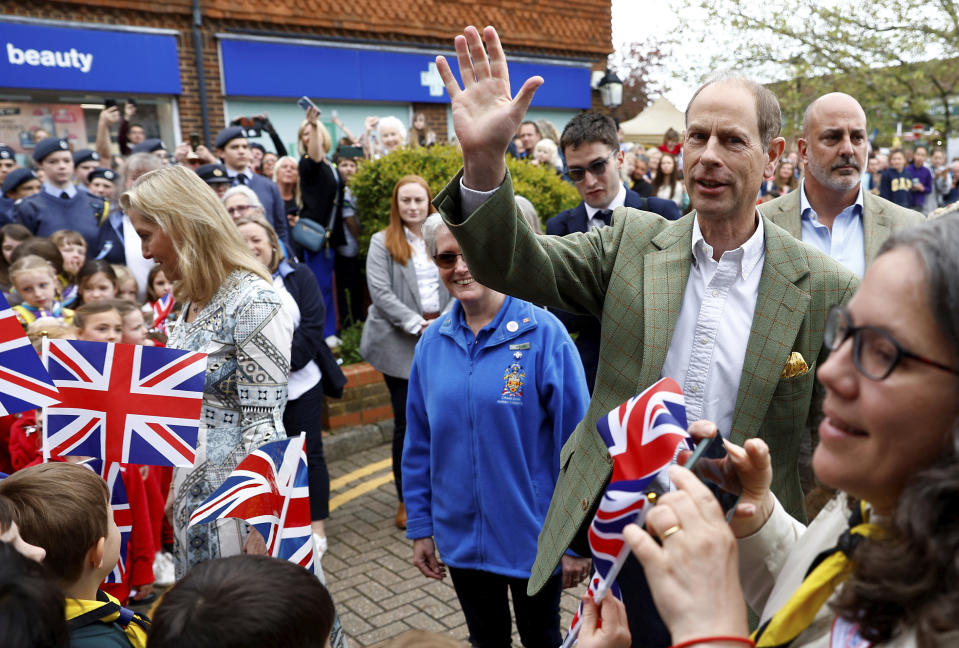 Britain's Prince Edward and Sophie, Duchess of Edinburgh arrive to attend a Big Lunch with residents and representatives from the Royal British Legion, the Scouts and the Guides, in Cranleigh Village Hall, Cranleigh, England. Sunday May 7, 2023. (Peter Nicholls/Pool via AP)