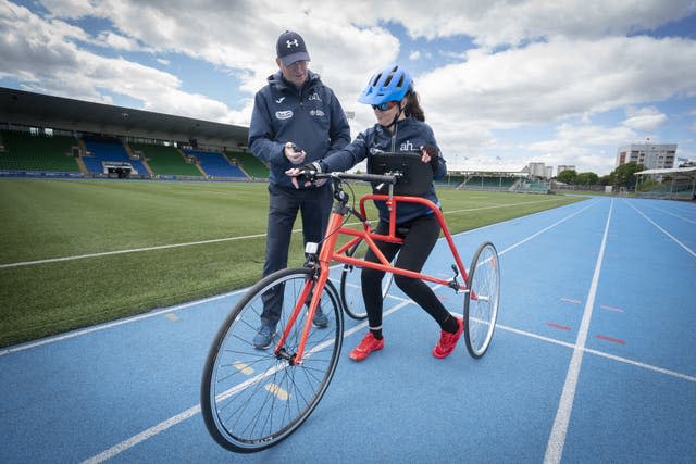 Dr Julie McElroy training for the London Marathon with a frame runner