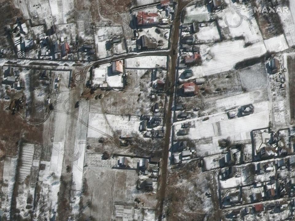 Troops and military vehicles deployed in Ozera, northeast of Antonov Airport.