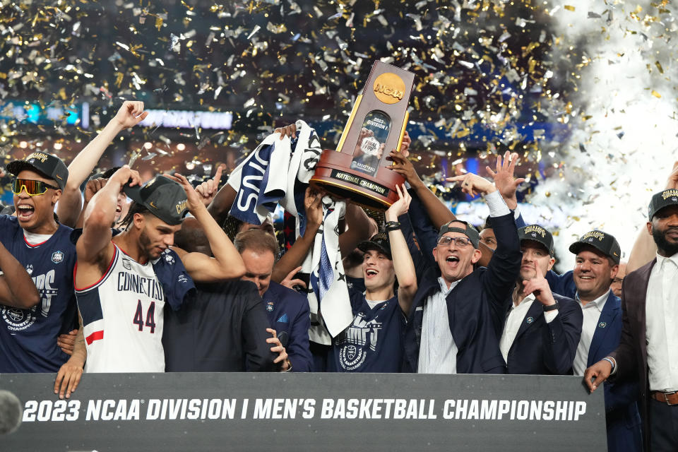 HOUSTON, TEXAS - APRIL 03: The Connecticut Huskies celebrates winning the NCAA Men's Basketball Tournament Final Four championship game against the San Diego State Aztecs at NRG Stadium on April 03, 2023 in Houston, Texas. (Photo by Mitchell Layton/Getty Images)