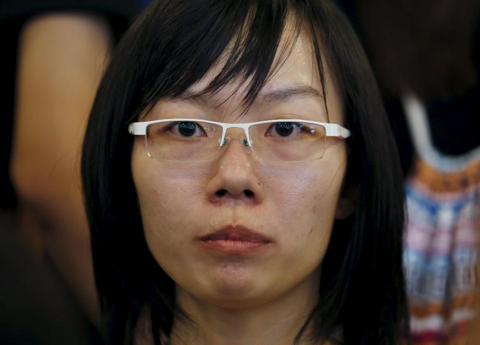 Han Hui Hui seen at a 2015 protest in Hong Kong to demand the release of Singaporean teenager Amos Yee. (PHOTO: Reuters)