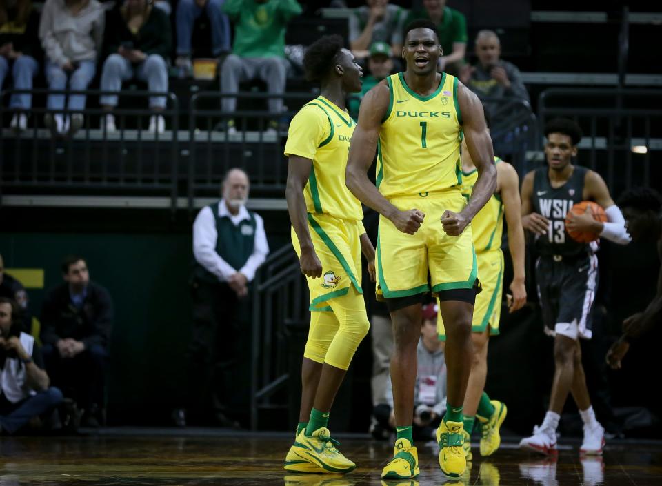 Oregon’s N'Faly Dante celebrates a turnover as the Oregon Ducks host the Washington State Cougars to open Pac-12 play Thursday, Dec. 1, 2022, at Matthew Knight Arena in Eugene, Ore.