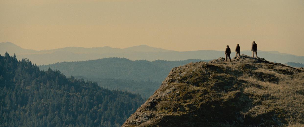 A trio of Bigfoot creatures gather at an outcropping in northern California, location for the filming of "Sasquatch Sunset," a strange and compelling new film from David and Nathan Zellner starring Jesse Eisenberg and Riley Keough.