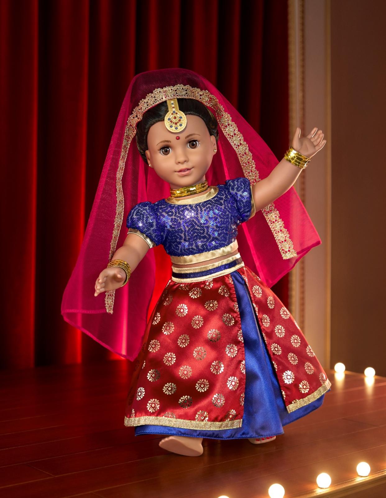 Kavi's wardrobe includes a Bollywood-inspired dance look. (Photo: Jason Tidwell for American Girl)