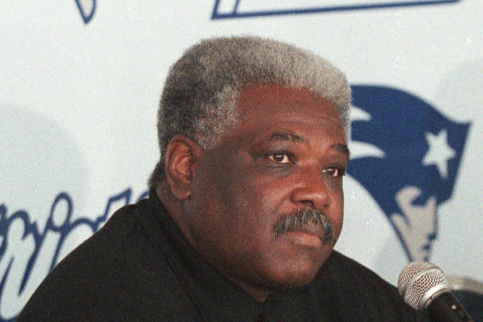 FILE - New England Patriots vice president of player personnel Bobby Grier is shown in April 1999. The San Jose Sharks have hired longtime NHL forward Mike Grier to become the first Black general manager in NHL history. Grier fills the spot that opened when Doug Wilson stepped away for health reasons earlier this year in a barrier-breaking move for the league on Tuesday, July 5, 2022. Grier comes from a family of successful sports executives with his brother, Chris, serving as general manager of the NFL’s Miami Dolphins, and his father, Bobby, serving as a longtime coach and front office executive for the New England Patriots and Houston Texans. (AP Photo/David Kamerman, File)