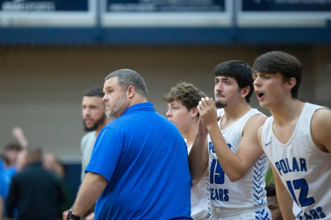 Bracken County head coach Adam Reed watches his team play against Mason County during the opening round of the White, Greer & Maggard Holiday Classic at Lexington Catholic High School on Tuesday.