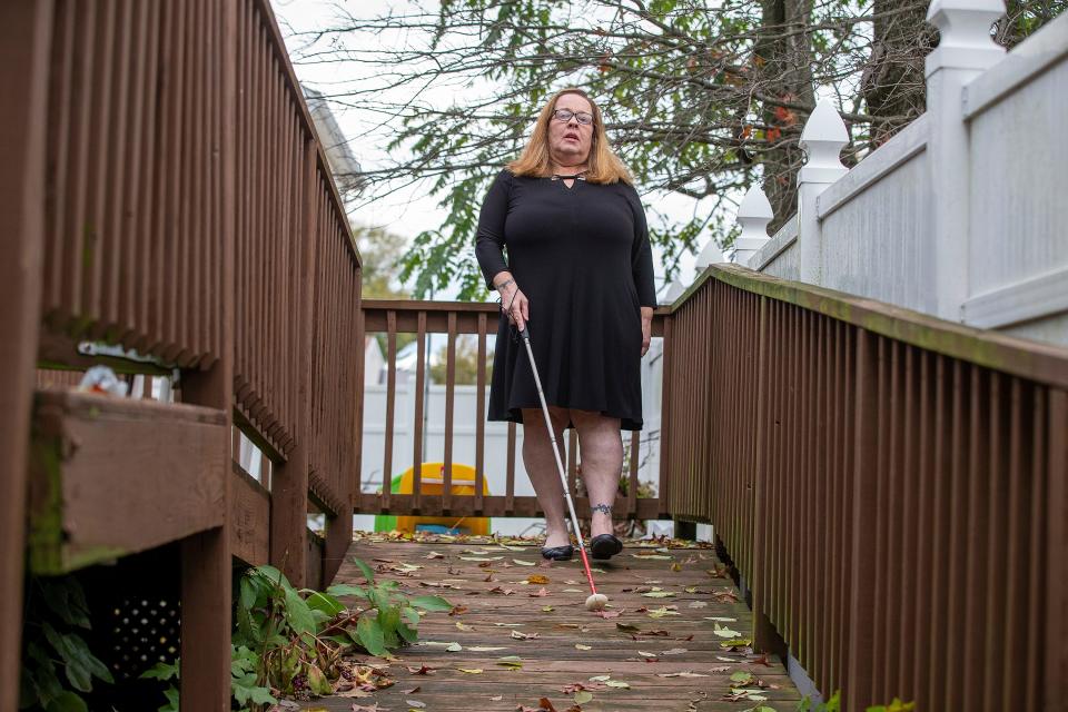 Linda Melendez, president of the New Jersey chapter of the National Federation of the Blind, stands outside her home in Keyport. She's organized with vision- and hearing-loss communities to push for voting reform in the state.
