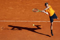 Tennis - Monte Carlo Masters - Monaco, 22/04/2017. David Goffin of Belgium plays a shot to Rafael Nadal of Spain. REUTERS/Eric Gaillard